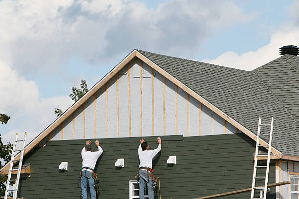 Professional Emergency Siding Repair technician working in Wye Mills, MD